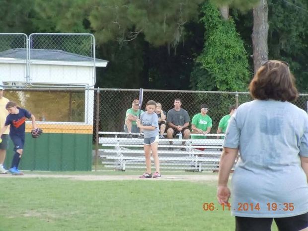 A game in progress at the field with a camera datestamp in the corner